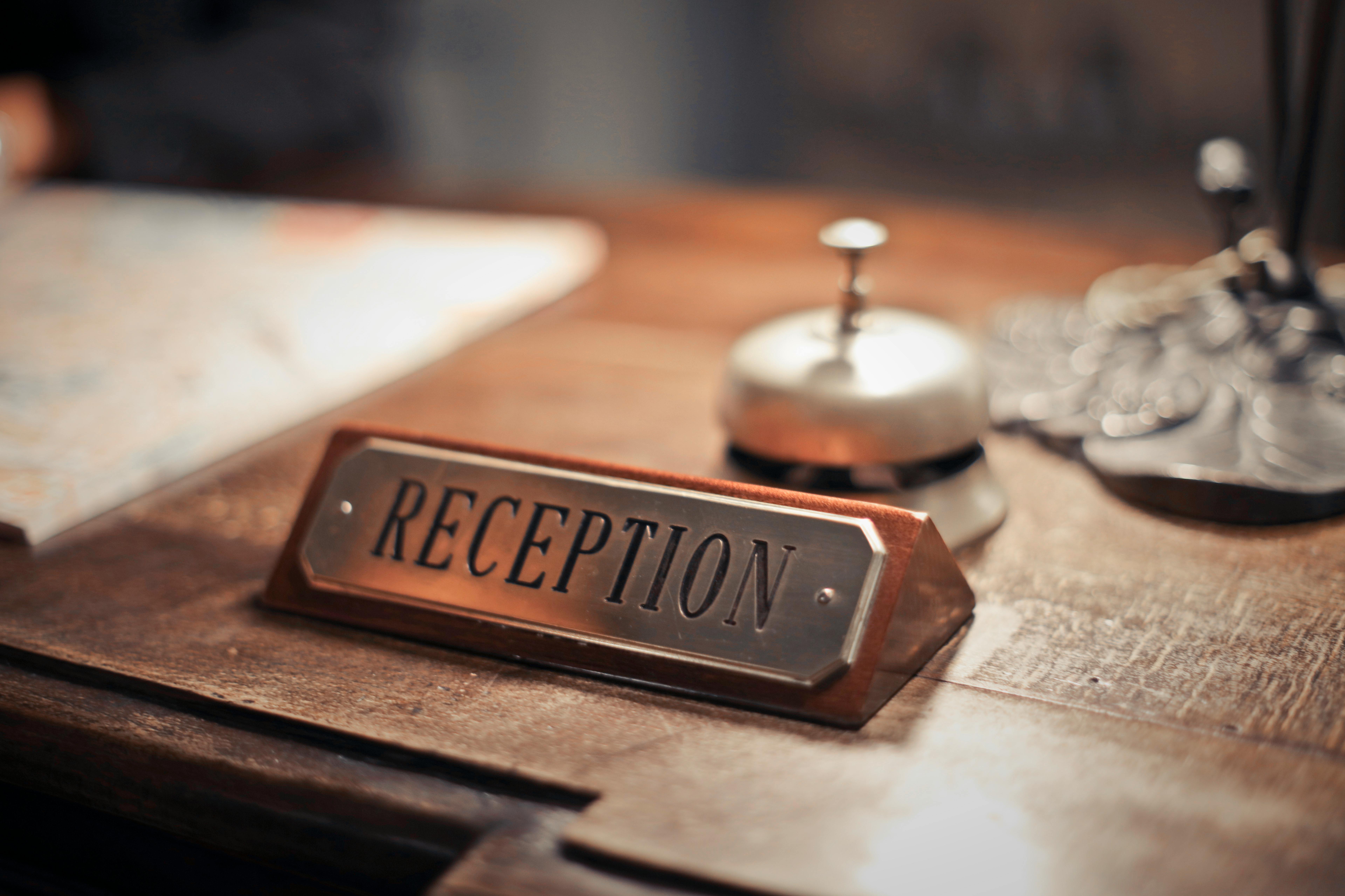Hotel reception desk with professional service and welcoming atmosphere